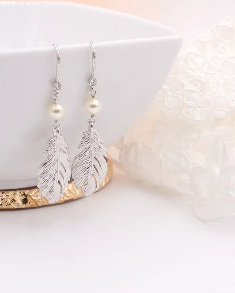Clyde – Boucles d’Oreilles Mariée Plumes & Perles