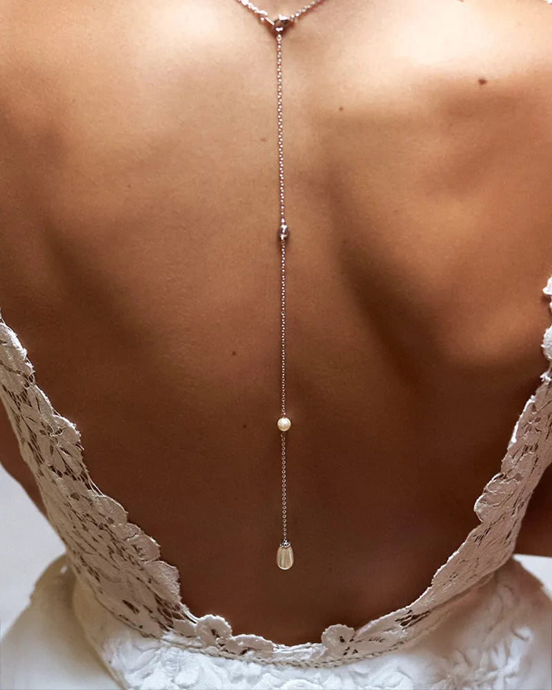 Bijou de dos Saya – perle et goutte cristal pour robe dos nu élégante
